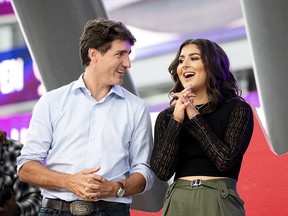 Liberal Leader Justin Trudeau is seen on stage with Bianca Andreescu as she takes part in the SheTheNorth rally after winning the US Open.