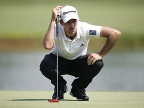 Nick Taylor of Canada looks over a putt on the 18th green during the third round of the Barbasol Championship at Keene Trace Golf Club on July 20, 2019 in Nicholasville, Kentucky.