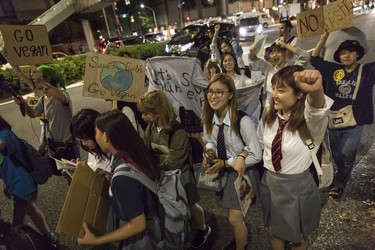 Participants hold signs and shout slogans during Global Climate Strike on September 20, 2019 in Tokyo, Japan. Students and adults joined together on Friday as part of a global mass day to demand action on climate change.