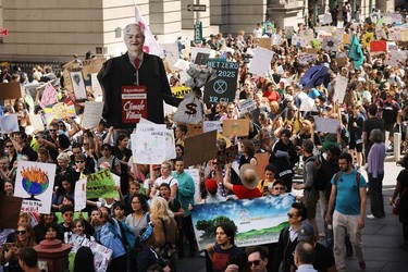 People march to demand action on the global climate crisis on September 20, 2019 in New York City. In what could be the largest climate protest in history and inspired by the teenage Swedish activist Greta Thunberg, people around the world are taking to the streets to demand action to combat climate change.