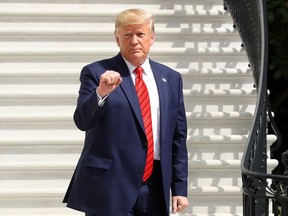U.S. President Donald Trump gestures as he returns to the White House in Washington, D.C. after attending the United Nations General Assembly on Sept. 26, 2019.