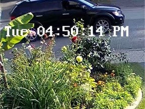 On Thursday, police then released a home surveillance camera image of a black Dodge Journey believed to have been involved in Tuesday's shooting.