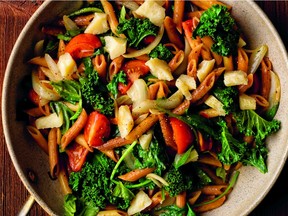 Rod Butters’ Pan-Fried Pasta develops a nutty flavor as it cooks in olive oil. The addition of spinach, kale, tomatoes, fresh basil and plenty of Parmigiano-Reggiano make this a satisfying one-dish meal. Photo: David McIlvride