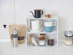 Think vertically for storage solutions in your home. Photo credit: Room in Order for Homes online - Simple solutions for sorting out your home by Rebecca Keillor  [PNG Merlin Archive]