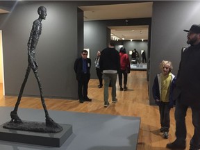 Man Walking, bronze, 1960, by Alberto Giacometti in Alberto Giacometti: A Line Through Time at the Vancouver Art Gallery to Sunday, Sept. 29.
