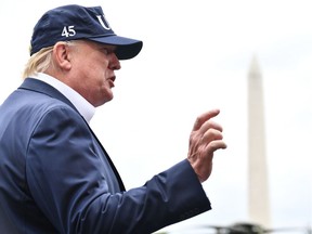 US President Donald Trump speaks to the press upon arrival at the White House in Washington, DC, on September 1, 2019 after spending the weekend at the Camp David presidential retreat.