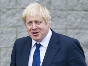 Britain's Prime Minister Boris Johnson leaves after visiting Peterhead Fish Market in Peterhead, Scotland on Sept. 6, 2019.