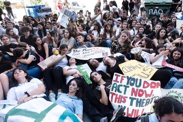 Cypriots students and families take part in a protest against climate change in the Cypriot capital Nicosia on September 20, 2019. - Millions of people around the world are taking part in protests demanding action on climate issues. The Global Strike For Climate is being held only days ahead of the scheduled United Nations Climate Change Summit in New York.