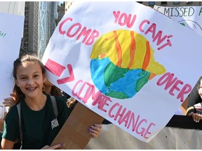 A student holds up a sign during the Global Climate Strike march at Foley Square in New York on Sept. 20, 2019.