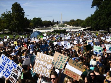 Students gather and march during the Global Climate Strike march in Washington, DC on September 20, 2019. - Crowds of children skipped school to join a global strike against climate change, heeding the rallying cry of teen activist Greta Thunberg and demanding adults act to stop environmental disaster. It was expected to be the biggest protest ever against the threat posed to the planet by climate change.