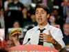This is an edited photo illustration of Justin Trudeau holding a burger.