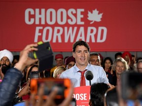 Canada's Prime Minister Justin Trudeau speaks with supporters during an election campaign rally in Surrey, British Columbia, Canada September 24, 2019.