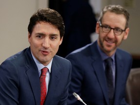 Canada's Prime Minister Justin Trudeau and his principal secretary Gerald Butts take part in a meeting with Italy's Prime Minister Paolo Gentiloni (not pictured) on Parliament Hill in Ottawa, Ontario, Canada, April 21, 2017.