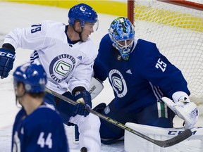 Michael Ferland and Jacob Markstrom in action in Victoria.