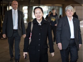 Huawei Chief Financial Officer, Meng Wanzhou, leaves her Vancouver home to appear in British Columbia Supreme Court, in Vancouver, on September 24, 2019.
