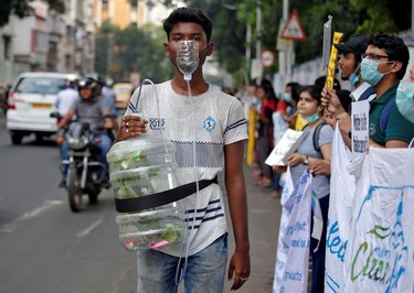 An activist takes part in a Global Climate Strike rally in Kolkata, India, September 20, 2019.