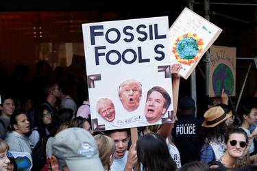 Activists take part in a demonstration as part of the Global Climate Strike in Manhattan in New York, U.S., September 20, 2019.