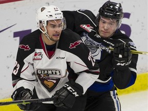 Veteran Jadon Joseph of the Vancouver Giants, left, has been dealt to the Moose Jaw Warriors as the WHL squad trims its overage numbers. The Giants still have five 20 year olds on the roster and must get down to three. Their regular season starts Friday in Prince George.