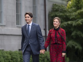 Prime Minister Justin Trudeau arrives at Rideau Hall with his wife Sophie Gregoire Trudeau to meet with Governor General Julie Payette, in Ottawa on Wednesday, Sept. 11, 2019.