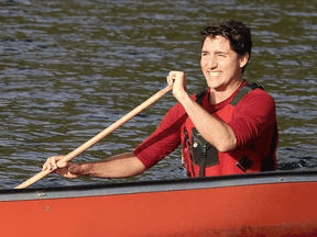 Liberal Leader Justin Trudeau paddles around in Sudbury's Lake Laurentian before vowing a new investment in camping.