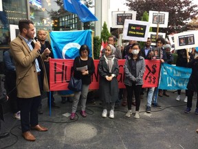 Port Coquitlam mayor Brad West addresses a crowd outside an anti-China protest in Vancouver on Sept. 25, 2019. [PNG Merlin Archive]