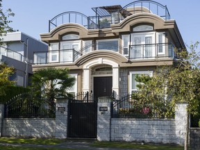 The house once owned by Caixuan Qin on Burquitlam Drive in south Vancouver.