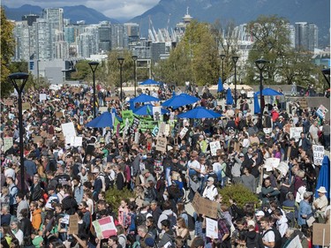 Vancouver, BC: SEPTEMBER 27, 2019 -- Tens of thousands of people concerned about the state of the earth's climate converged on Vancouver city hall Friday, September 27, 2019 as part of a global initiative to bring attention to the environment. The throngs of people marched across the Cambie Street bridge and into downtown.