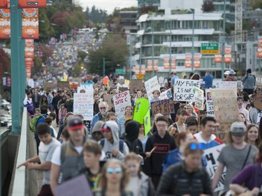 Vancouver, BC: SEPTEMBER 27, 2019 -- Tens of thousands of people concerned about the state of the earth's climate converged on Vancouver city hall Friday, September 27, 2019 as part of a global initiative to bring attention to the environment. The throngs of people marched across the Cambie Street bridge and into downtown.