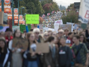 Vancouver, BC: SEPTEMBER 27, 2019 -- Tens of thousands of people concerned about the state of the earth's climate converged on Vancouver city hall Friday, September 27, 2019 as part of a global initiative to bring attention to the environment. The throngs of people marched across the Cambie Street bridge and into downtown.