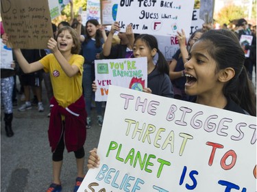 Vancouver, BC: SEPTEMBER 27, 2019 -- Tens of thousands of people concerned about the state of the earth's climate converged on Vancouver city hall Friday, September 27, 2019 as part of a global initiative to bring attention to the environment. The throngs of people marched across the Cambie Street bridge and into downtown.