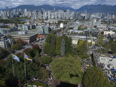 Vancouver, BC: SEPTEMBER 27, 2019 -- Tens of thousands of people concerned about the state of the earth's climate converged on Vancouver city hall Friday, September 27, 2019 as part of a global initiative to bring attention to the environment. The throngs of people marched across the Cambie Street bridge and into downtown.