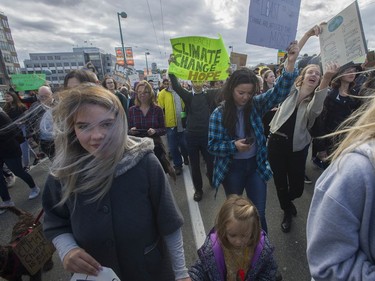 Vancouver, BC: SEPTEMBER 27, 2019 -- Tens of thousands of people concerned about the state of the earth's climate converged on Vancouver city hall Friday, September 27, 2019 as part of a global initiative to bring attention to the environment. The throngs of people marched across the Cambie Street bridge and into downtown.