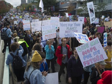 Vancouver, BC: SEPTEMBER 27, 2019 -- Tens of thousands of people concerned about the state of the earth's climate converged on Vancouver city hall Friday, September 27, 2019 as part of a global initiative to bring attention to the environment. The throngs of people marched across the Cambie Street bridge and into downtown.