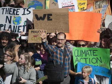 Vancouver, BC: SEPTEMBER 27, 2019 -- Tens of thousands of people concerned about the state of the earth's climate converged on Vancouver city hall Friday, September 27, 2019 as part of a global initiative to bring attention to the environment. The throngs of people marched across the Cambie Street bridge and into downtown.