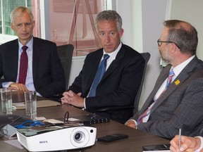 From left, Michael Crothers, President of Shell Canada, Mark Fitzgerald, President & CEO, Petronas Canada and Geoff Morrison from Canadian Association of Petroleum Producers during an editorial board meeting.