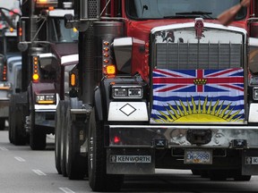 Truckers protest on East Hastings Street on Sept. 25 as roughly 200 truck-loggers drive their rigs from the Interior into Vancouver to meet up at the Vancouver Convention Centre, where the Union of B.C. Municipalities convention is being held.