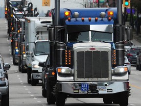 Truck protest on E. Hastings Street as roughly 200 truck loggers drive their rigs from the Interior of B.C. into Vancouver to meet up at the Vancouver Convention Centre, where the Union of BC Municipalities (UBCM) convention is being held,  September 25, 2019.