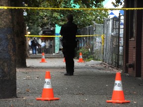 A man has pled guilty this week following a targeted shooting in Vancouver's Downtown Eastside last year. In this September 2019 file photo, police can be seen investigating in the area of West Hastings and Abbott where a shooting took place.