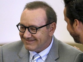 In this June 3, 2019 file photo, actor Kevin Spacey listens to attorney Alan Jackson during a pretrial hearing at district court in Nantucket, Mass.