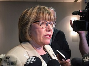 Former federal finance minister Anne McLellan speaks to reporters at the World Cannabis Congress in Saint John, N.B., on Monday, June 11, 2018. The former Liberal minister charged with making recommendations on whether the roles of justice minister and attorney general should be separated is recommending no structural changes should be made. Photo: Kevin Bissett/CP