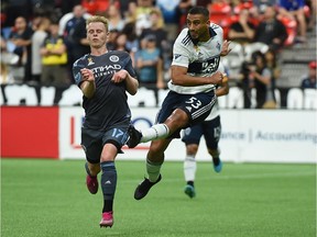 Though Whitecaps defender Ali Adnan, right, showed some quality in the eliminating defeat against Gary Mackay-Steven and NYCFC on Saturday, he looked fatigued and possibly injured.