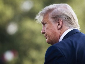 President Trump stops to talk to members of the media as he walks from the Oval Office to board Marine One on the South Lawn of the White House on Monday. MUST CREDIT: Washington Post photo by Jabin Botsford