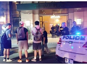 People and police officers stand outside Trump Plaza after a car crashed into the building's lobby in New Rochelle, New York, U.S., September 17, 2019, in this still image from video obtained via social media. Jose Abarca via REUTERS ATTENTION EDITORS - THIS IMAGE HAS BEEN SUPPLIED BY A THIRD PARTY. MANDATORY CREDIT. NO RESALES. NO ARCHIVES.