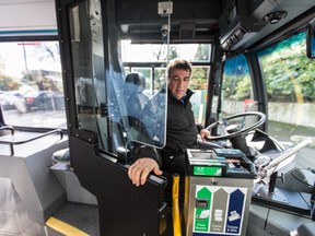 B.C. Transit safety and training officer Sal Ruffolo shows a new door designed to protect bus drivers.
