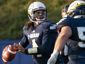 UBC Thunderbirds quarterback Tommy Yanchuk drops back to pass against the University of Regina Rams during U Sports Canada West football action at UBC in Vancouver.