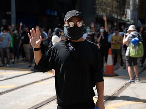 People protest a government ban on face masks in Central on October 4, 2019 in Hong Kong, China.