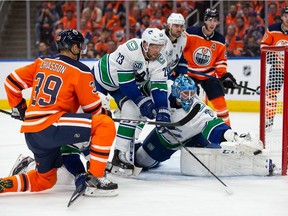 Alex Chiasson of the Edmonton Oilers can't get the puck past goaltender Jacob Markstrom of the Vancouver Canucks during the second period at Rogers Place.