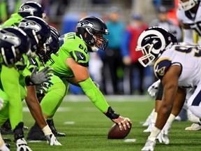 Seattle Seahawks centre Justin Britt gets set to snap the ball during an Oct. 3, 2019 NFL game against the Los Angeles Rams at CenturyLink Field in Seattle.