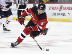 Jack Hughes #86 of the New Jersey Devils skates against the Edmonton Oilers at the Prudential Center on October 10, 2019 in Newark, New Jersey.