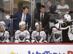 Vancouver Giants assistant coach Jamie Heward, left, and head coach Michael Dyck in a game agains the Regina Pats at the Brandt Centre in Regina.